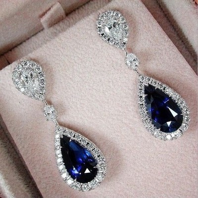 Schöne Tropfen Ohrringe mit blauem Saphir und Diamant Akzenten
