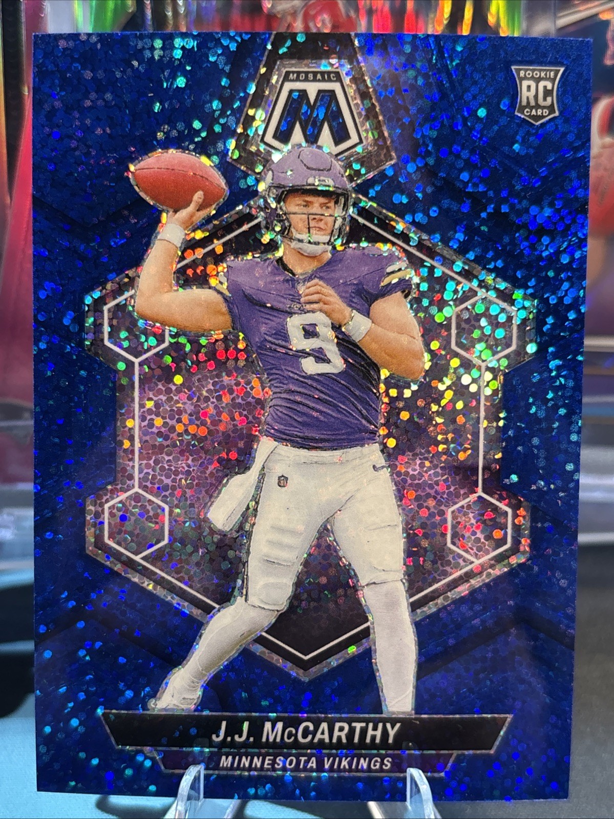 2024 Panini Mosaic - Rookies J.J. McCarthy #310 Blue Sparkle Prizm /96 (RC)