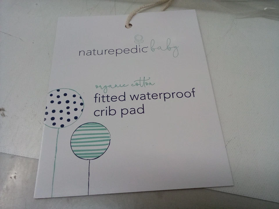 Almohadilla para cuna impermeable ajustada orgánica Naturepedic, Foto 3 de 4