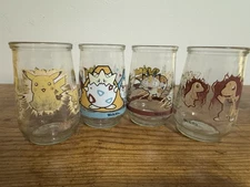 4 Vintage Welch’s Jelly Jar Glass Pokémon Meowth Pikachu Togepi Charmander
