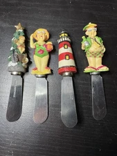 Boston Warehouse Man ,Woman, Lighthouse , Christmas Tree Cheese Knives Lot of 4