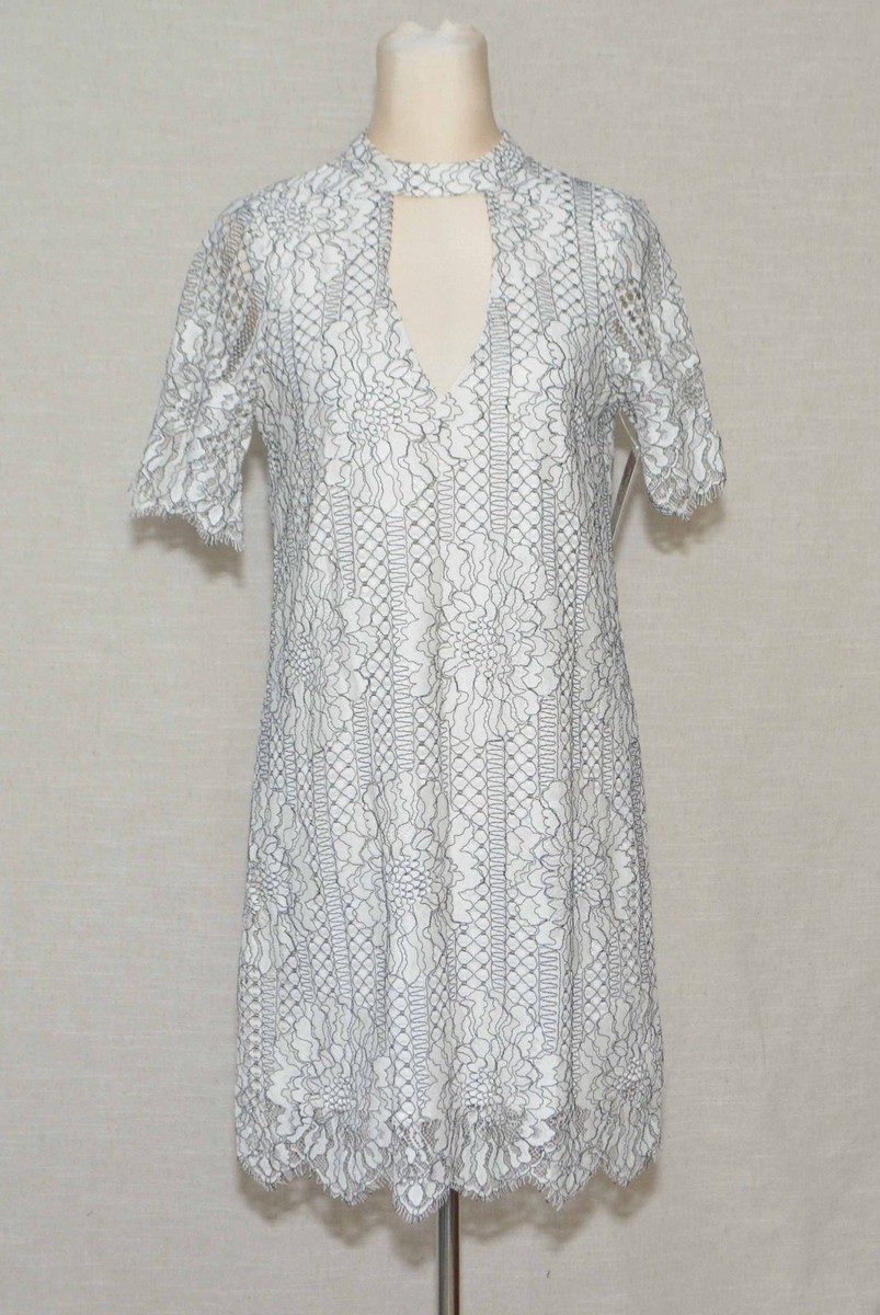 white lace dress with black heels Silk White Belted Lace Dress – Monique Lhuillier main image 0