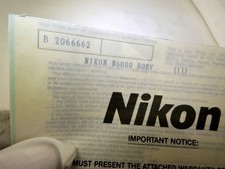 Nikon vintage warranty card expired for N6000 camera EN
