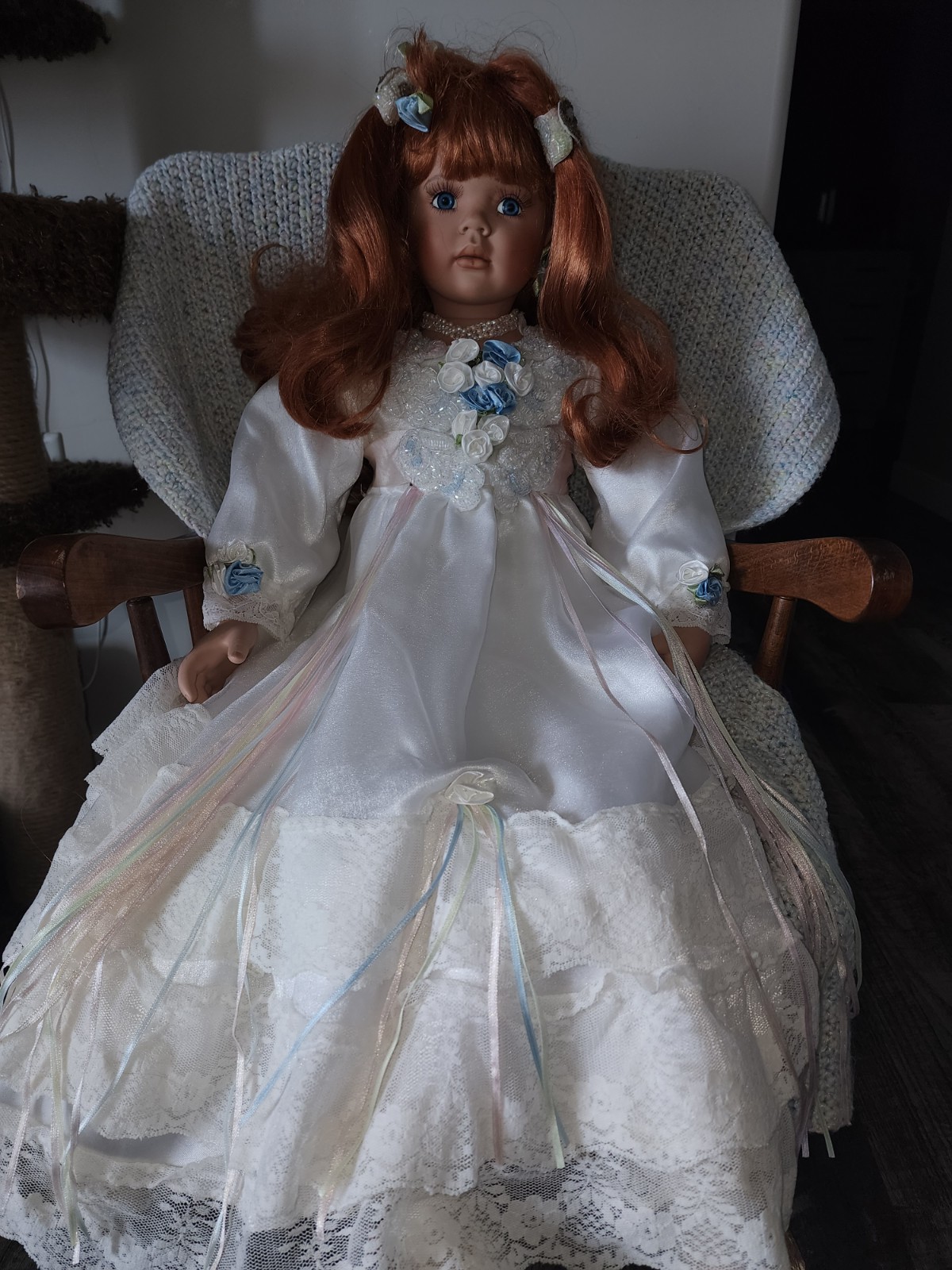 Porcelain Doll in very good condition Her hair Is messy and her shoes are dirty
