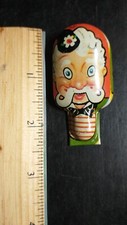 TIN NOISE MAKER TOY T. CONN Inc vintage metal clicker old circus man USA