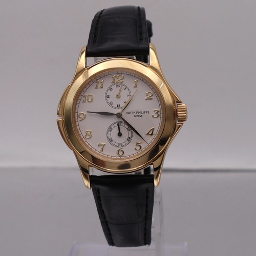 Patek Philippe Calatrava Travel Time 18K Yellow Gold White Dia...