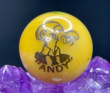 Vintage Peltier Glass 'ANDY' COMIC Peerless Patch Marble Green Yellow .69" 1