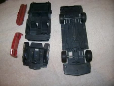 ERTL 1980s Camaro car parts-chassis w/wheels,interior, front & rear bumper clips