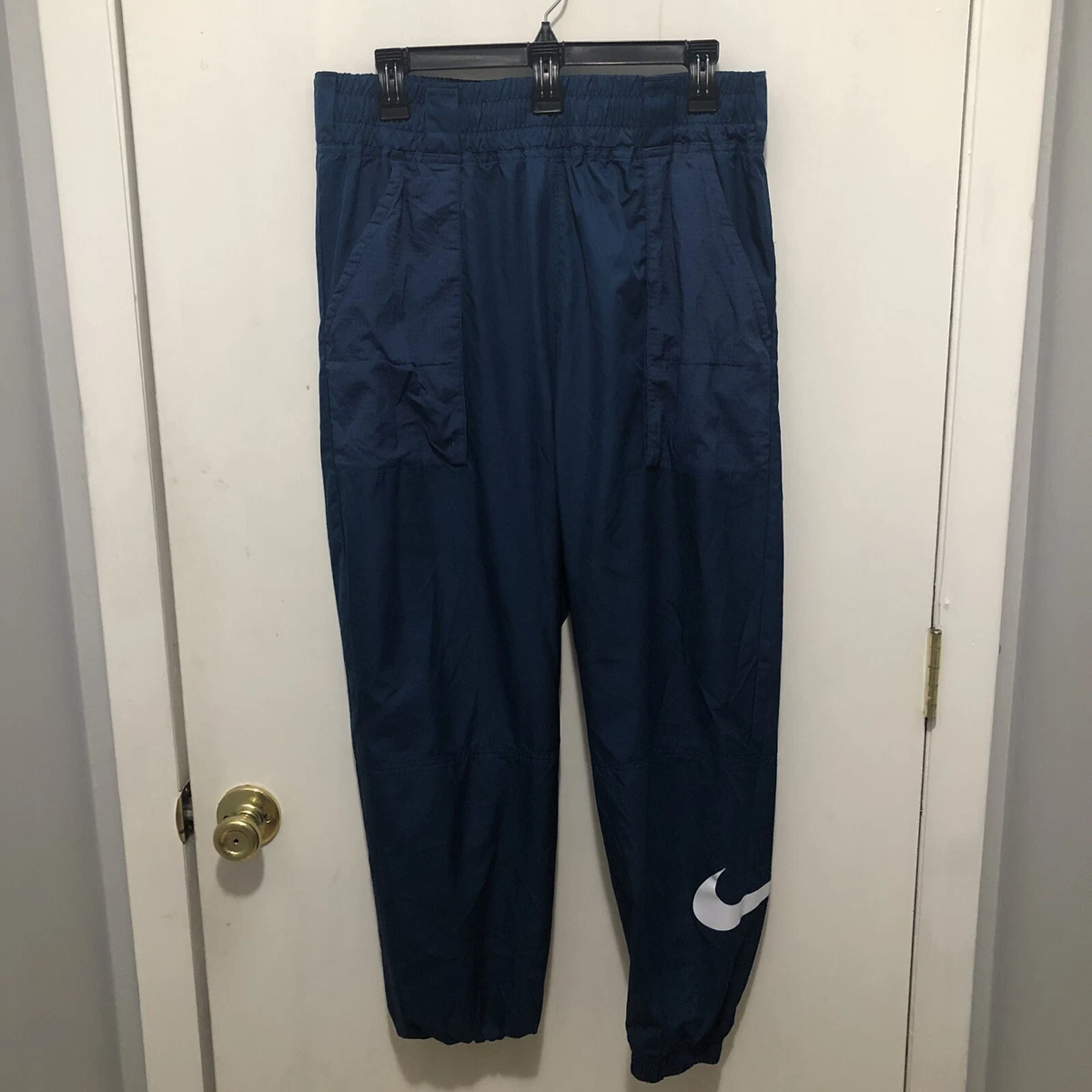 Women's nike sportswear online woven swoosh jogger pant
