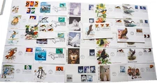 28 FDC First Day Covers Birds Parakeet Killer Whale Dog Cat Wolf Eagle 1990-1999