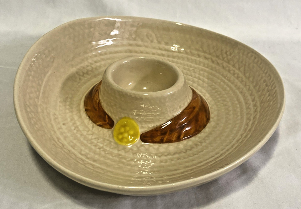 A kitschy vintage sombrero-shaped chip-and-dip bowl that doubles as a party conversation piece straight out of a 1970s dinner party.