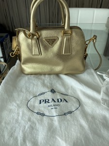 mini gold handbag