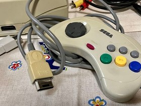 Sega Saturn body with 2 controllers and power memory (Sakura Wars package)