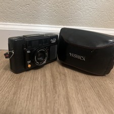Yashica 35mm Auto Focus Motor 35mm Film Camera and Yashica Case  Strap Read