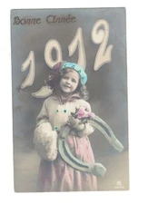 SE2272   YEARDATE 1912 VICTORIAN GIRL WITH MUFF POSING WITH HORSESHOE FANTASY
