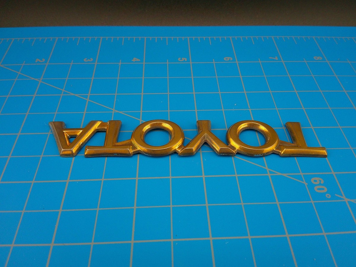 Vintage Toyota Gold Emblem Badge OEM Genuine 75447-AC010 SRJ ABS