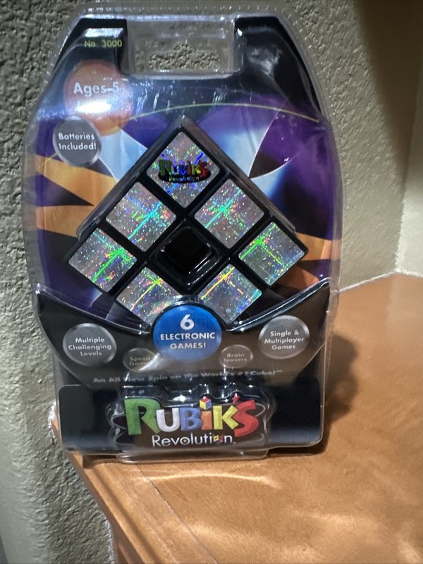 Rubik's Revolution Six Electronic Puzzle Games NEW