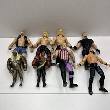 WWE Wrestling Lot Of 8 Action Figures Stone Cold Faarooq Double J SEE PHOTOS