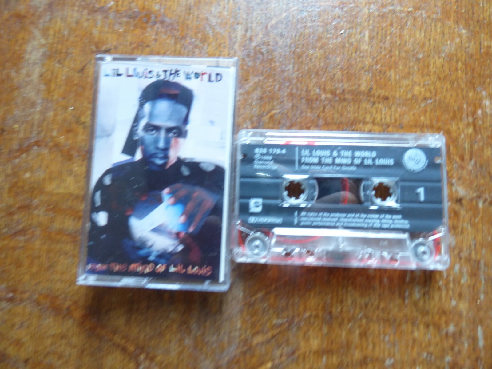 19898 AUDIO CASSETTE- BY LIL LOUIS AND THE WORLD