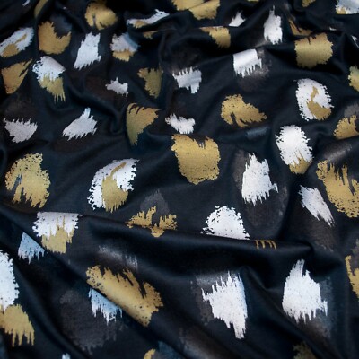  Italian top designer pure black cotton jersey fabric. Gold & silver print.