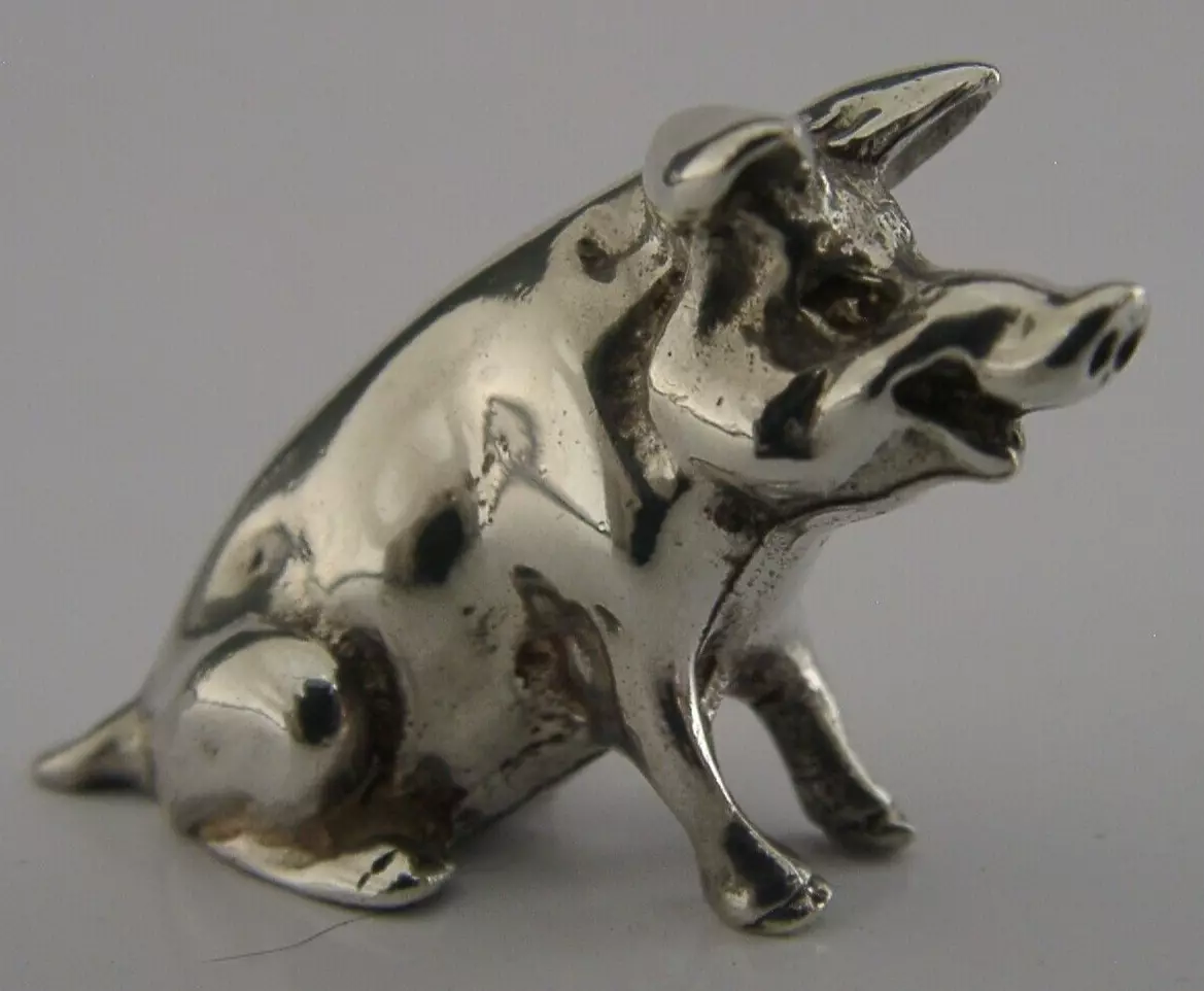 Sterling deals silver pig