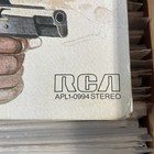 Sealed Honey Baby, Honey Baby SDTK with black revolver illustration and white RCA logo on cover.