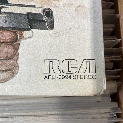 Sealed Honey Baby, Honey Baby SDTK with black revolver illustration and white RCA logo on cover.