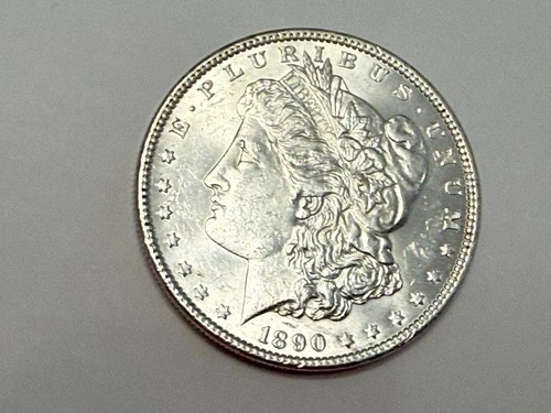 1890 Morgan U.S. silver dollar. AU-BU slider. #em1