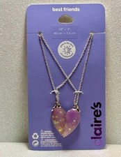 Claire  s Purple Heart with Stars that glows in the dark best friend necklaces