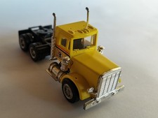 Herpa Kenworth Zugmaschine 3achs gelb "Ryder"1:87