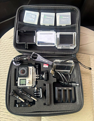GoPro HERO4 4K Action Camera Mega Bundle   4 Batteries, Charger, Cases, +Mounts