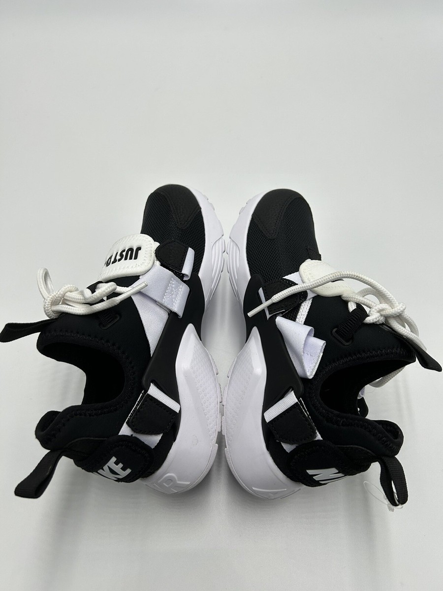 nike air huarache city low black and white