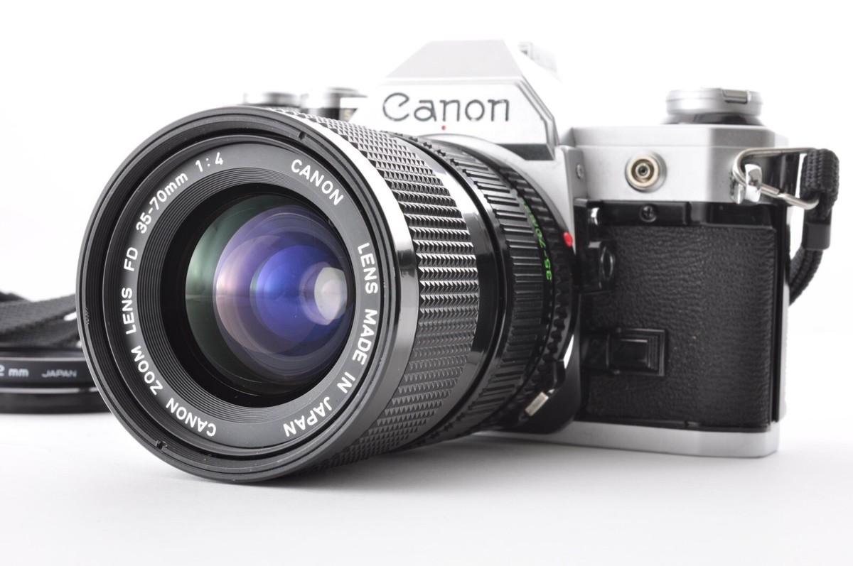 Canon AE-1 Silver / New FD 35-70mm f/4 Exc+5 by DHL or Fedex Canon AE-1 Silver / New FD 35-70mm f/4 Exc+5 by DHL or Fedex