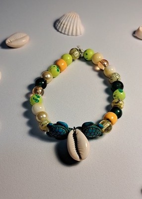 Armband Perlen für Glück, Glück und Schutz. Kaurimuschel Anhänger