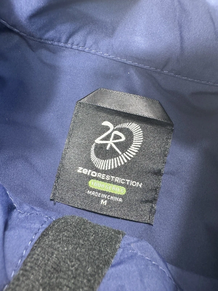 Cortavientos Zero Restriction Para Hombres Serie M Tour Cremallera Completa Mangas a Presión Stanwich Foto 3 de 4