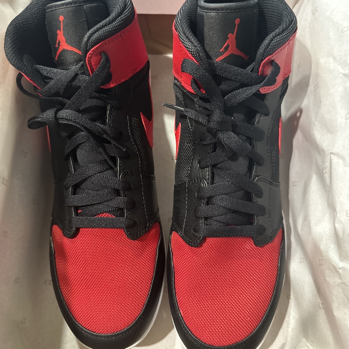 black and red jordan cleats