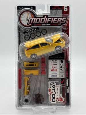 X Concepts Modifiers 2001 Ford Focus ZX3 Maßstab 1:43 gelb - im Blister