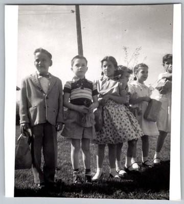 Vtg B&W Snapshot Group Of Children in Sunday Best Clothes Party Bags 1950s