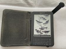 WOW Kindle Keyboard 3rd Gen D00901 Bundle w/New Battery, Leather Case Charger