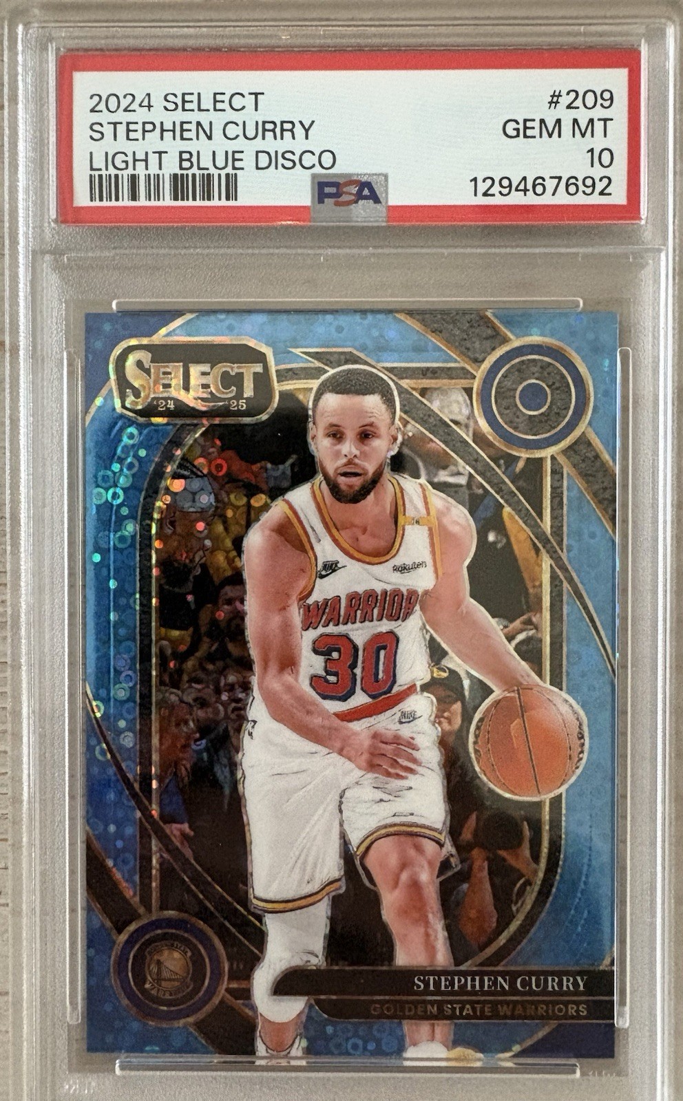 2024-25 Panini Select Courtside Stephen Curry #209 Light Blue Disco #/99 PSA 10