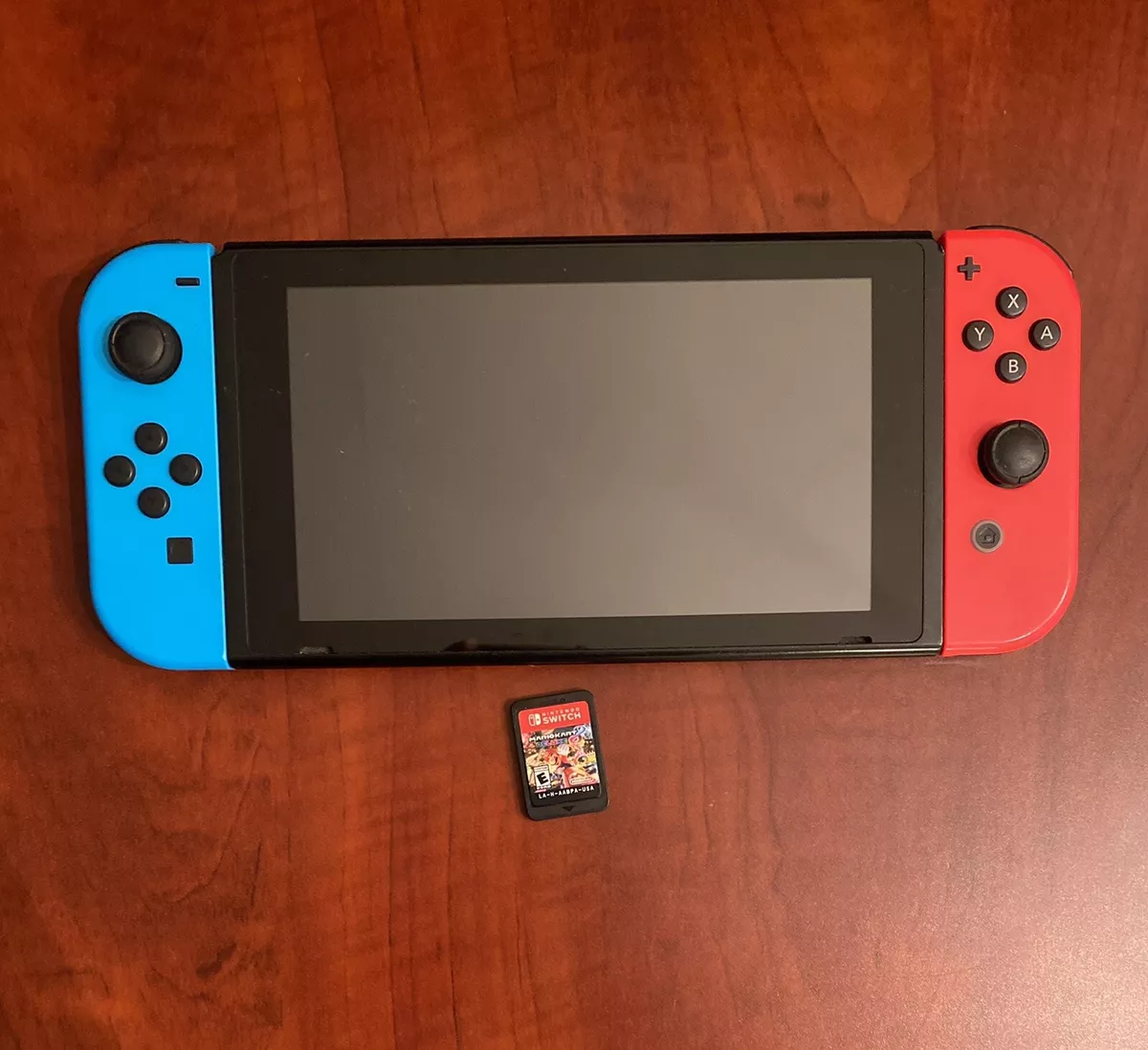 Nintendo Switch Bundle with Mario Red Joy-Con, $20 Nintendo eShop Credit, &  Carrying Case