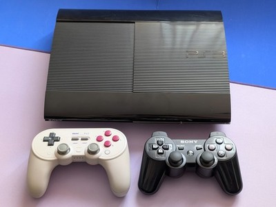 Sony Playstation 3 Super Slim 10 Spiele Sony PS3 Controller & 8BitDo Paket FSK18