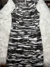 Calvin Klein Dress Size 8 animal print Sleeveless round Neck pleated skirt