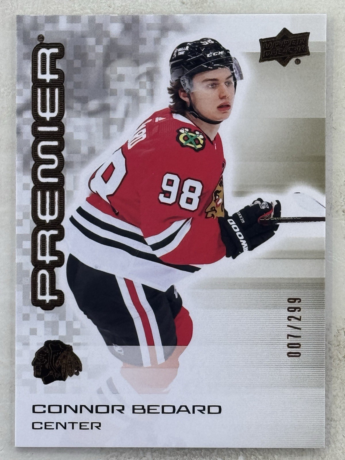 Connor Bedard 2024-25 Upper Deck Premier /299 #90 NHL Chicago Blackhawks Card