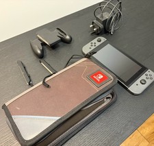 Nintendo Switch Console Bundle Case Charger JoyCon Grip Nightmare Game Case