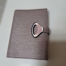Used Louis Vuitton planner cover with ballpoint pen