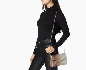 head over heels clutch bag