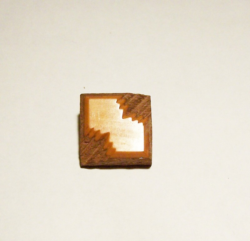 3/4 Square Orange Bakelite Button on Wood with Grooves