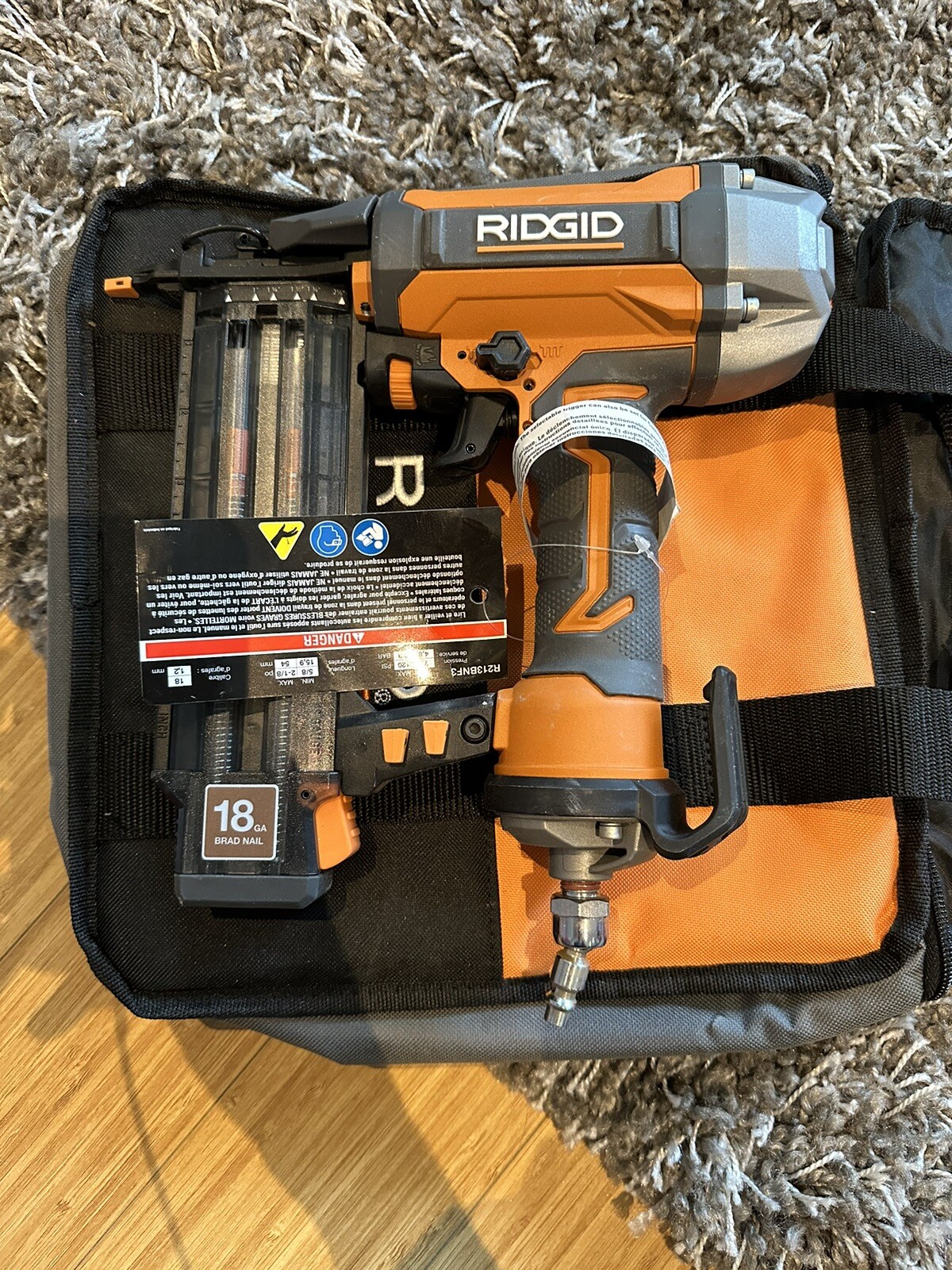 18-Gauge 2-1/8 in. Brad Nailer with CLEAN DRIVE Technology, Tool Bag, and Sample