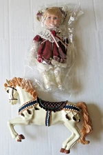 HERITAGE SIGNATURE COLLECTION HAILEY PORCELAIN DOLL & CAROUSEL HORSE - WRAPPED